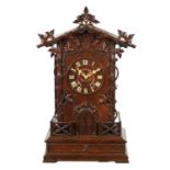 A LARGE LATE 19TH CENTURY BLACK FOREST TRUMPETER CLOCK