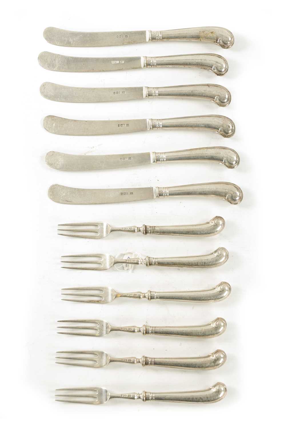 A SET OF EDWARDIAN SILVER FRUIT KNIVES AND FORKS