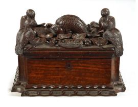 AN IMPRESSIVE 18TH CENTURY CONTINENTAL CARVED HARDWOOD TABLE CASKET