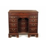 A GOOD EARLY GEORGE III FIGURED MAHOGANY GENTLEMANS ESTATE KNEEHOLE DESK