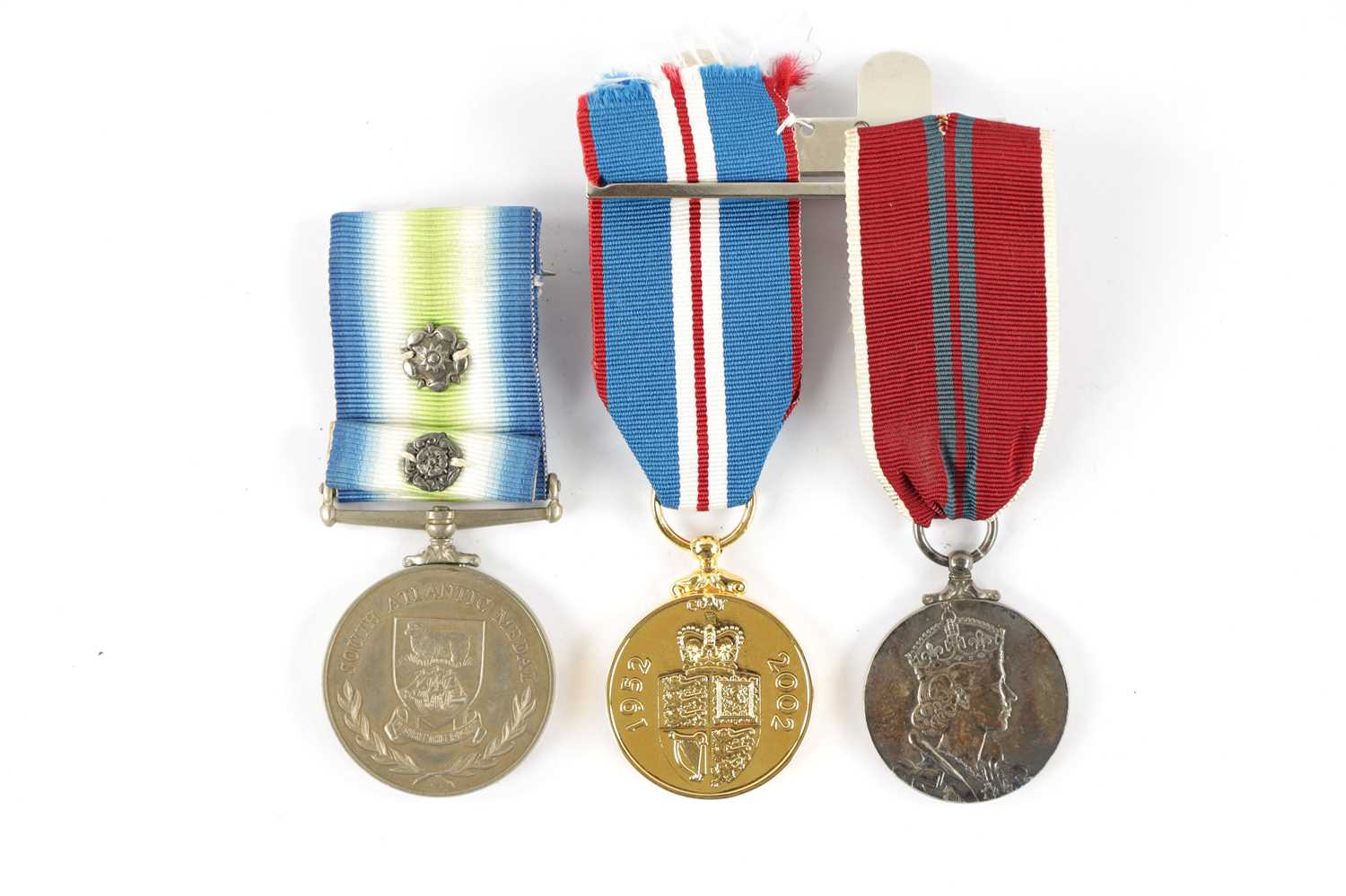 A 1982 FALKLANDS WAR SOUTH ATLANTIC MEDAL WITH ROSETTE.