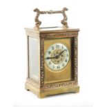 A LATE 19TH CENTURY FRENCH CHAMPLEVE ENAMEL CARRIAGE CLOCK