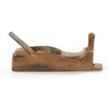 A RARE EARLY 18TH CENTURY WOODEN PLANE