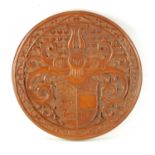 A FINE CARVED BOXWOOD TREENWARE CIRCULAR HANOVERIAN COAT OF ARMS