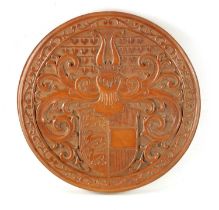 A FINE CARVED BOXWOOD TREENWARE CIRCULAR HANOVERIAN COAT OF ARMS