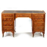 A 20TH CENTURY FRENCH MAHOGANY DESK