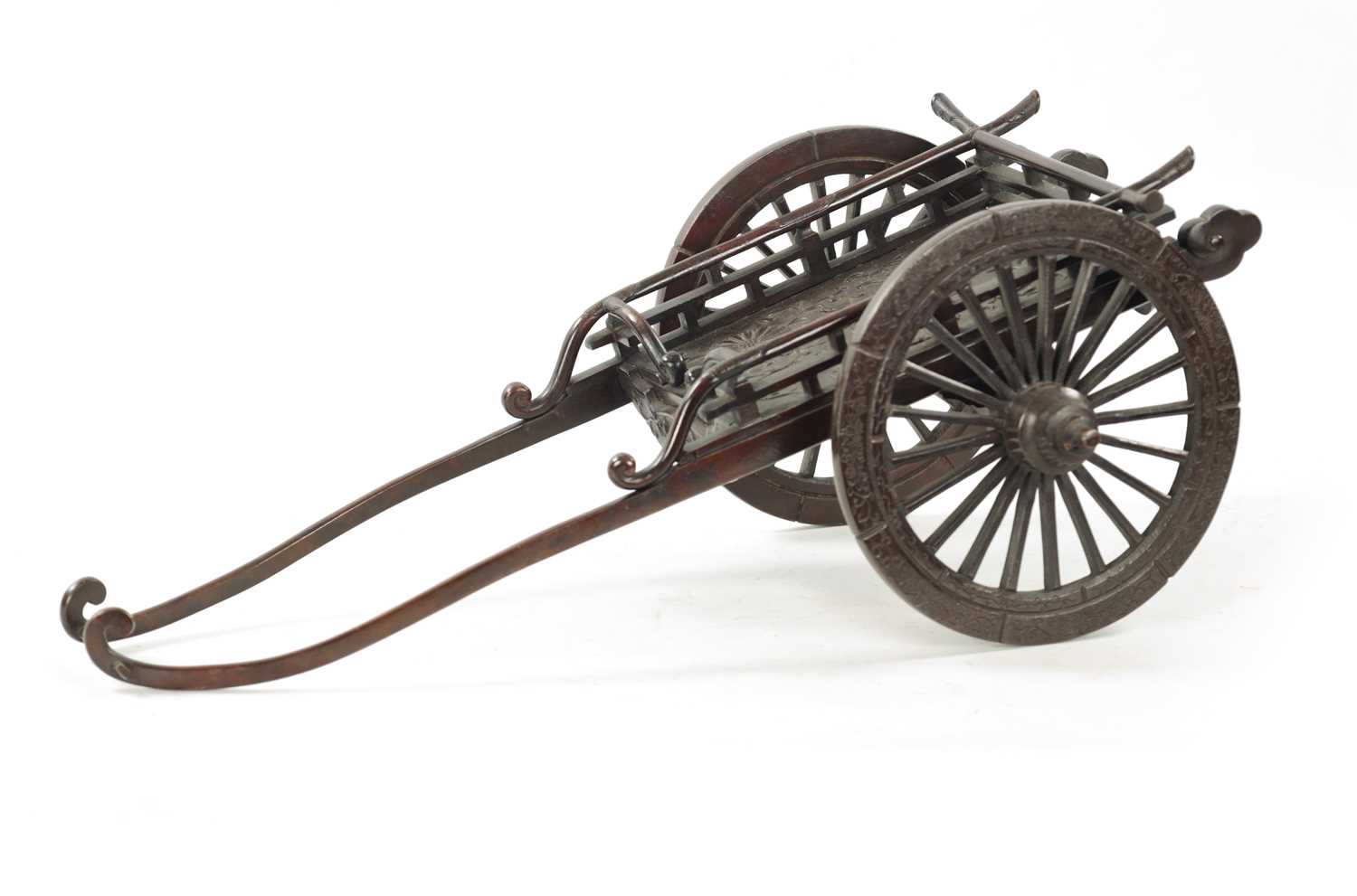 A JAPANESE MEIJI PERIOD PATINATED BRONZE MODEL OF A CARRIAGE
