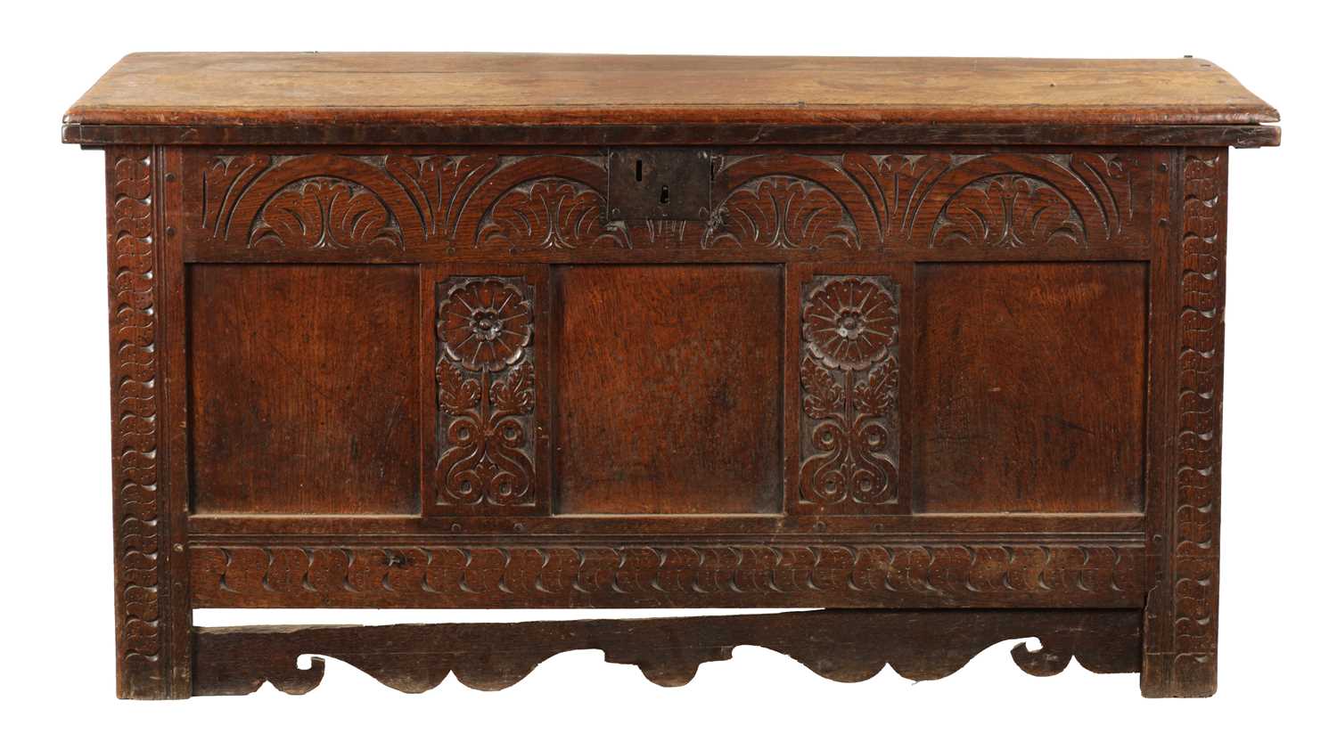 A LATE 17TH CENTURY CARVED OAK THREE PANELLED COFFER