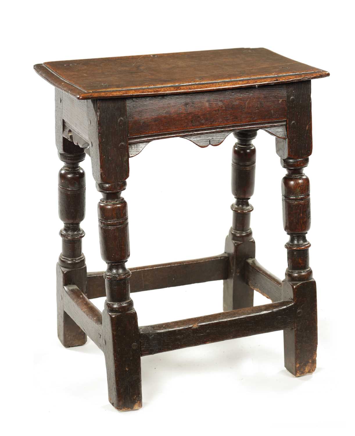 A 17TH CENTURY OAK JOINT STOOL