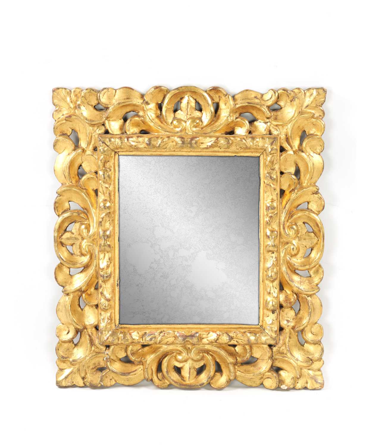 A 17TH CENTURY ITALIAN SMALL GILT GESSO HANGING MIRROR