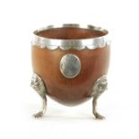 AN 18TH CENTURY SILVER MOUNTED CARVED COCONUT CUP