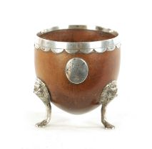 AN 18TH CENTURY SILVER MOUNTED CARVED COCONUT CUP