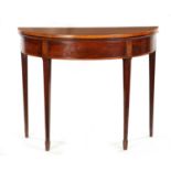 A GEORGE III FIGURED MAHOGANY SCOTTISH DEMI LUNE TEA TABLE