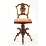 A 19TH CENTURY INLAID ROSEWOOD REVOLVING MUSIC CHAIR