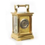 A LATE 19TH CENTURY FRENCH BRASS REPEATING CARRIAGE CLOCK