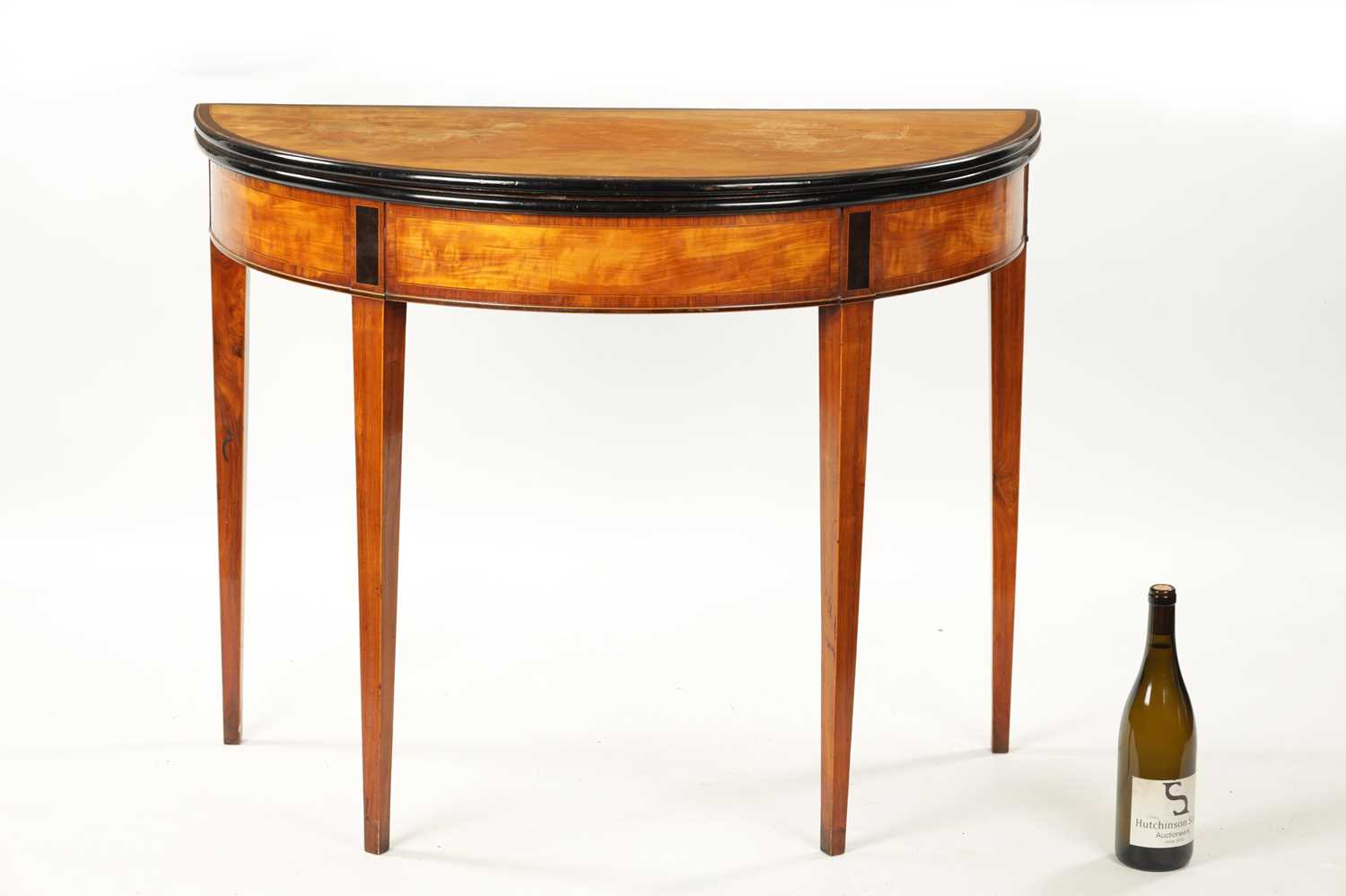 A GEORGE III SATINWOOD AND INLAID EBONISED DEMI LUNE FOLD OVER CARD TABLE - Image 2 of 10