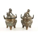A PAIR OF CHINESE LIDDED INCENSE BURNERS