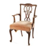 AN 18TH CENTURY CARVED MAHOGANY CHIPPENDALE STYLE OPEN ARMCHAIR