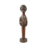 A 19TH CENTURY CONTINENTAL CARVED FRUITWOOD FIGURAL PIPE AND STAND