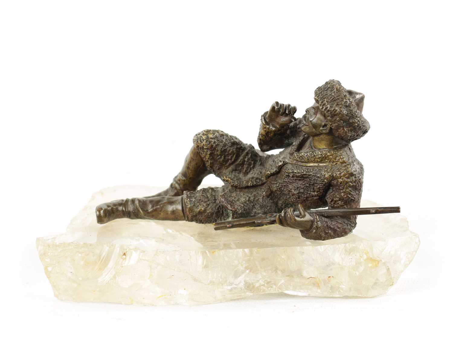 A LATE 19TH CENTURY RUSSIAN BRONZE SCULPTURE ON A ROCK CRYSTAL BASE