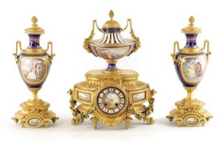 A FINE 19TH CENTURY FRENCH ORMOLU AND SEVRES PORCELAIN CLOCK GARNITURE