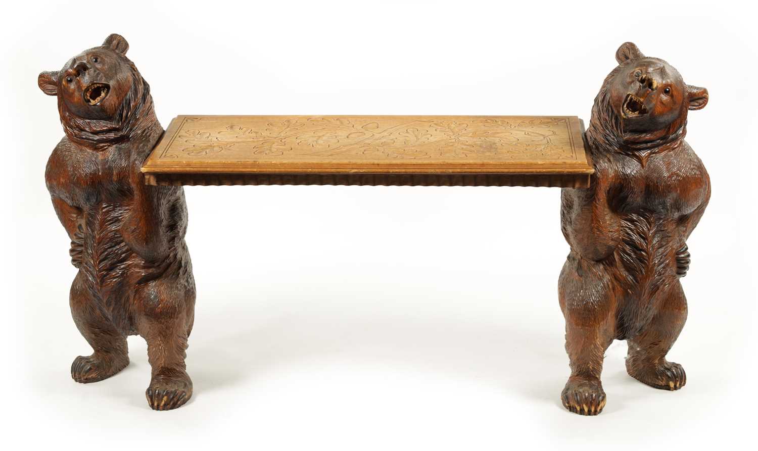 A GOOD 19TH CENTURY BLACK FOREST LINDEN WOOD CARVED BEAR HALL BENCH