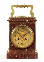 A 19TH CENTURY FRENCH GILT BRASS AND ROUGE MARBLE MANTEL CLOCK