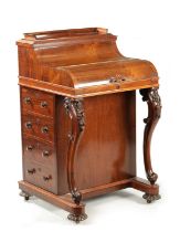 A VICTORIAN FIGURED ROSEWOOD POP-UP PIANO TOP DAVENPORT