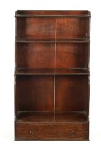 A REGENCY MAHOGANY WATERFALL BOOKCASE