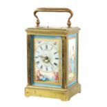 A LATE 19TH CENTURY FRENCH PORCELAIN PANELLED REPEATING CARRIAGE CLOCK