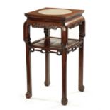 A 19TH CENTURY CHINESE HARDWOOD JARDINIERE STAND