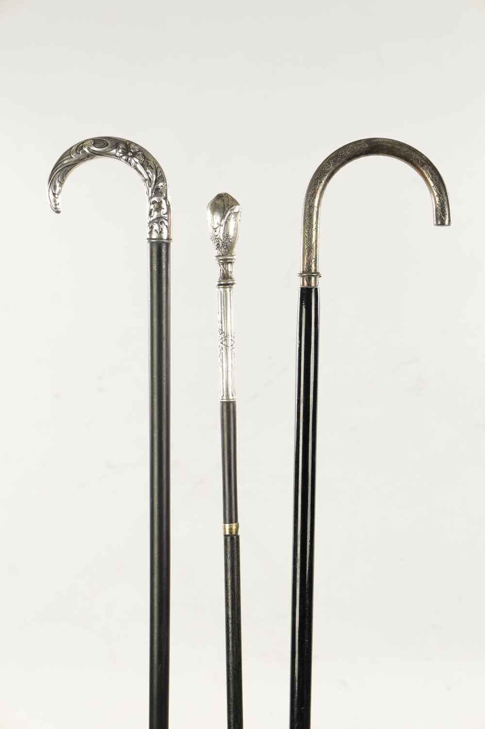 A COLLECTION OF THREE ART NOUVEAU SILVER TOPPED WALKING STICKS - Image 6 of 13