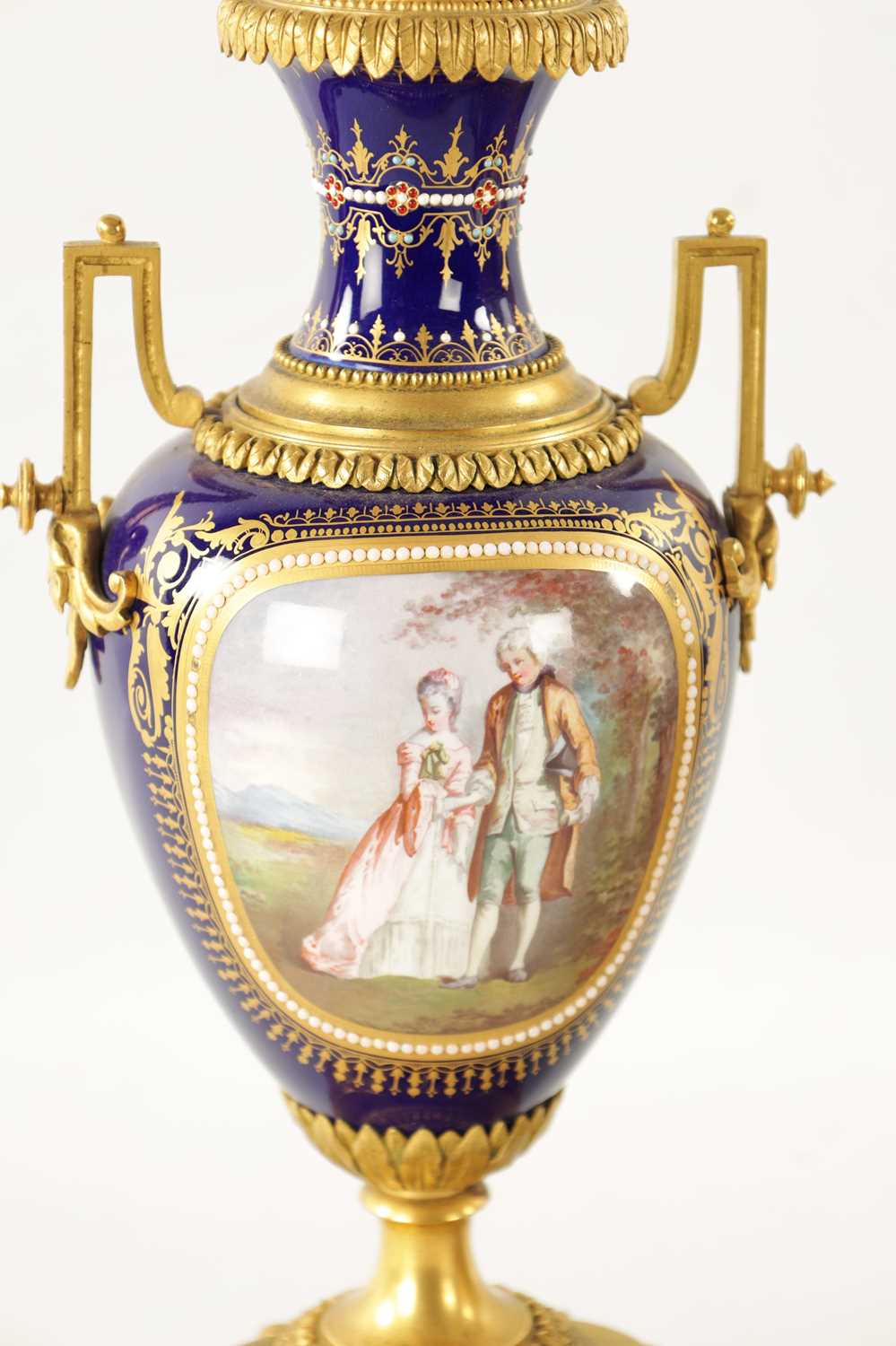 A FINE 19TH CENTURY FRENCH ORMOLU AND SEVRES PORCELAIN CLOCK GARNITURE - Image 5 of 12