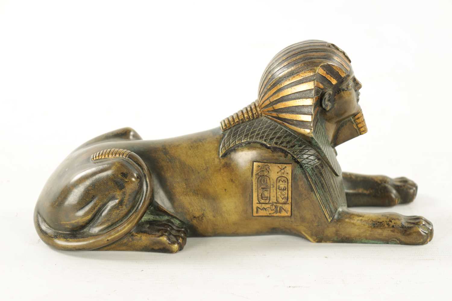 A 19TH CENTURY FRENCH EGYPTIAN REVIVAL BRONZE FIGURE OF A SEATED SPHINX - Image 6 of 7