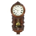 W. BROWN. LONDON. A LATE 19TH CENTURY CARVED WALNUT DOUBLE FUSEE WALL CLOCK