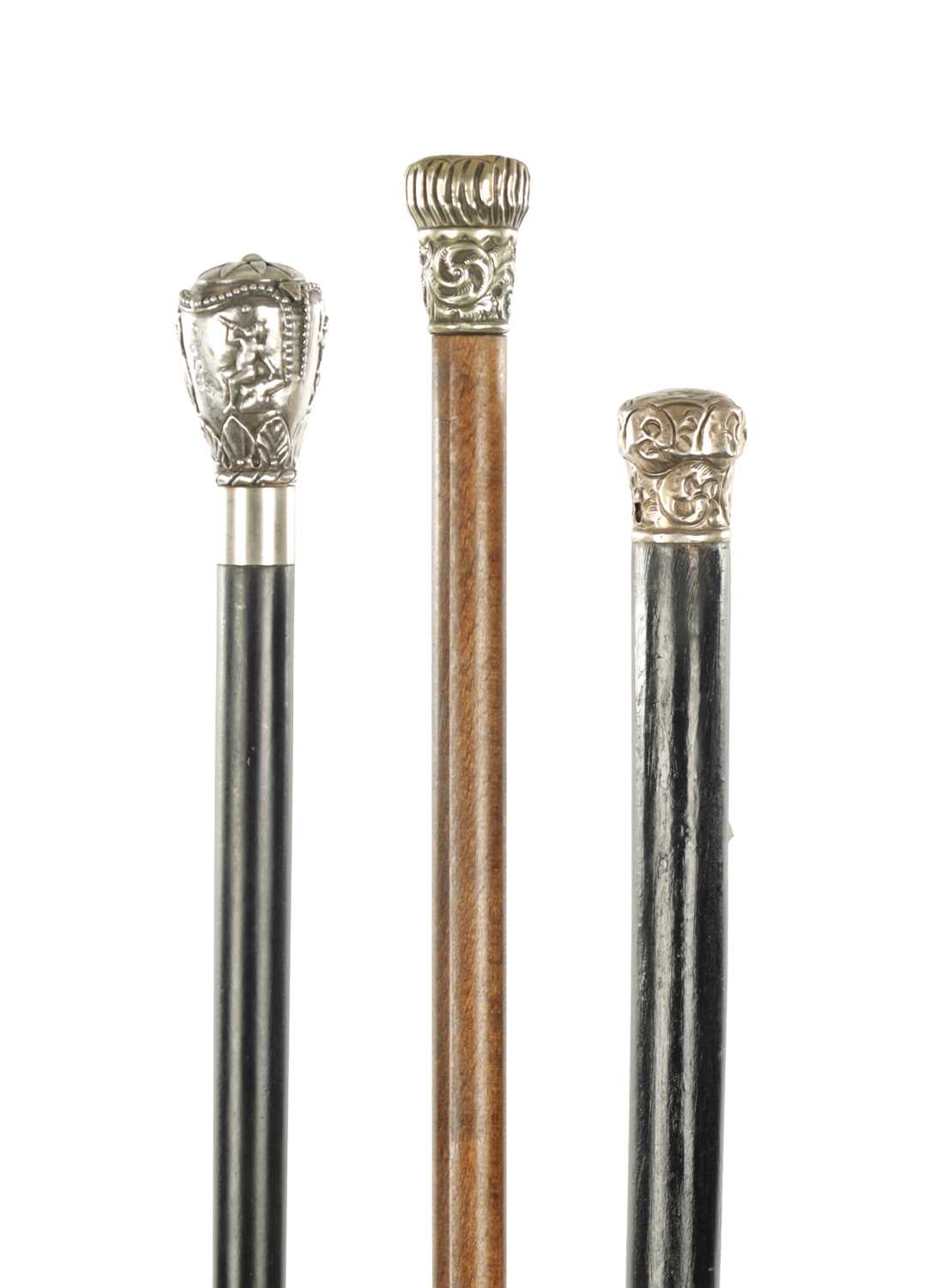 A COLLECTION OF THREE LATE 19TH CENTURY SILVER TOPPED WALKING STICKS