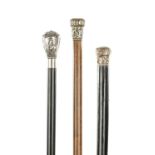 A COLLECTION OF THREE LATE 19TH CENTURY SILVER TOPPED WALKING STICKS