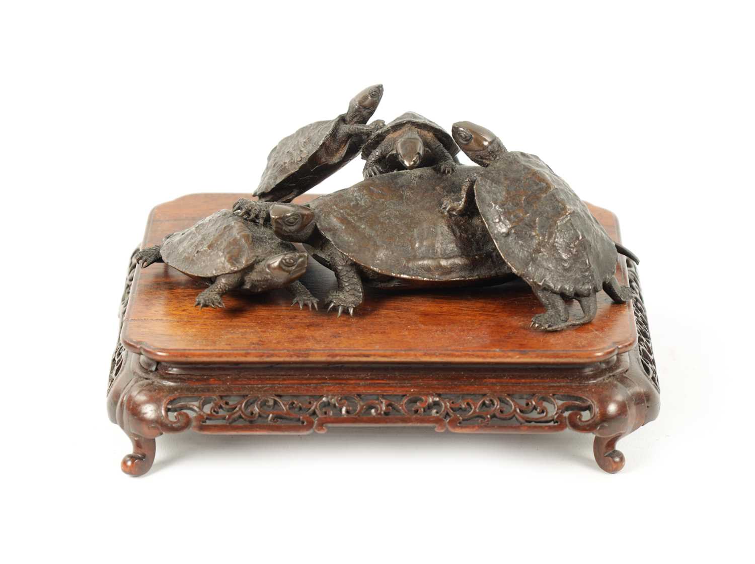 A FINE JAPANESE MEIJI PERIOD BRONZE SCULPTURE OF A GROUP OF TURTLES