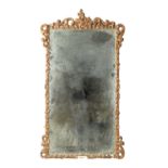 A 19TH CENTURY CARVED GILTWOOD MIRROR