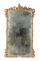 A 19TH CENTURY CARVED GILTWOOD MIRROR