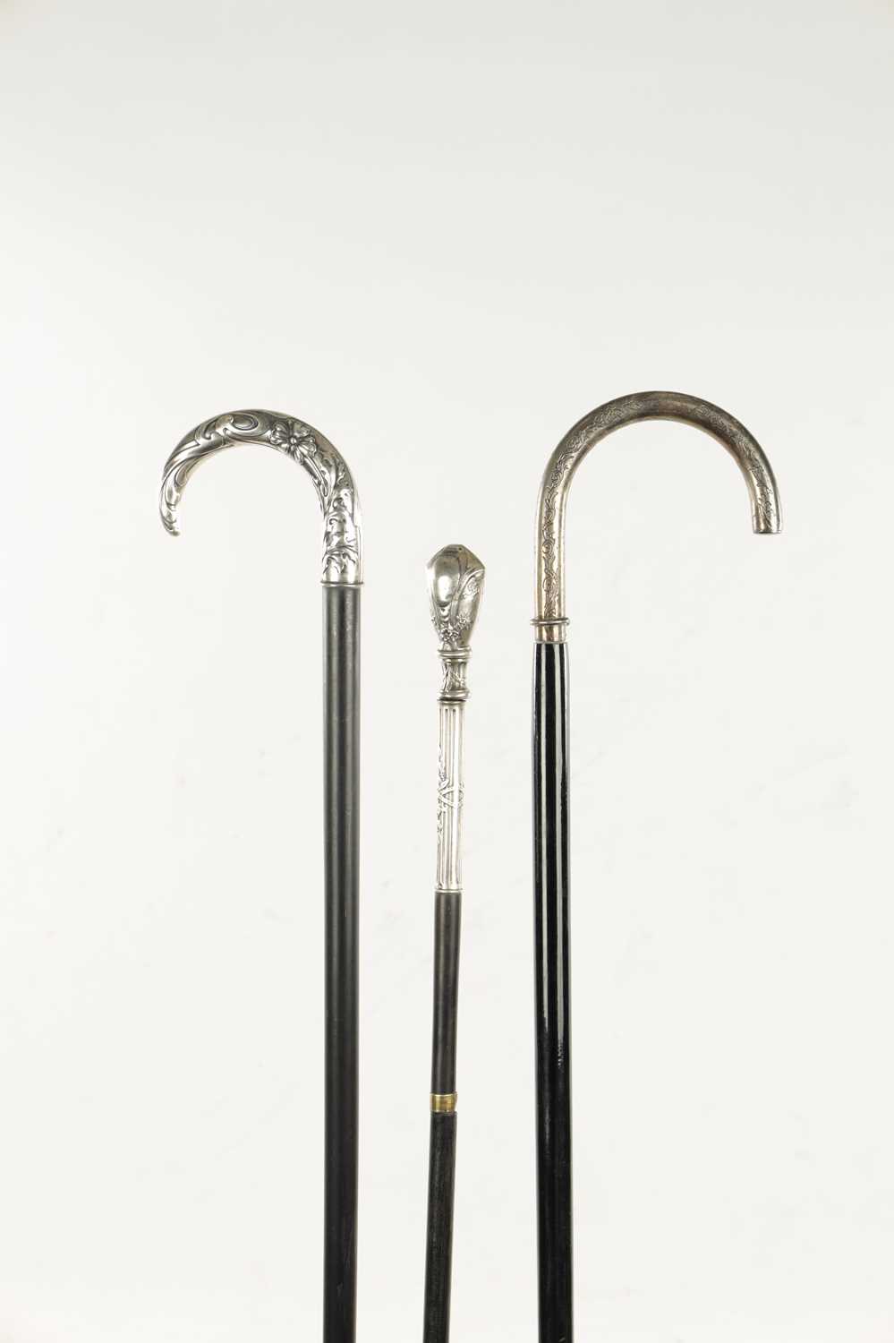 A COLLECTION OF THREE ART NOUVEAU SILVER TOPPED WALKING STICKS - Image 2 of 13