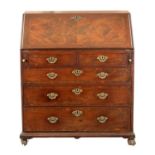 AN IMPORTANT FINE GEORGE II BRASS INLAID FIGURED MAHOGANY BUREAU ATTRIBUTED TO JOHN CHANNON