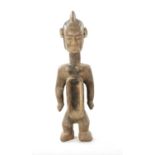 A CARVED AFRICAN KORO FEMALE LIBATION CUP / FIGURE