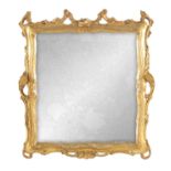 A SMALL EARLY 18TH CENTURY CARVED GILT-WOOD MIRROR