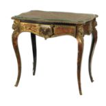A 19TH CENTURY FRENCH TORTOISESHELL BOULLE SERPENTINE TABLE
