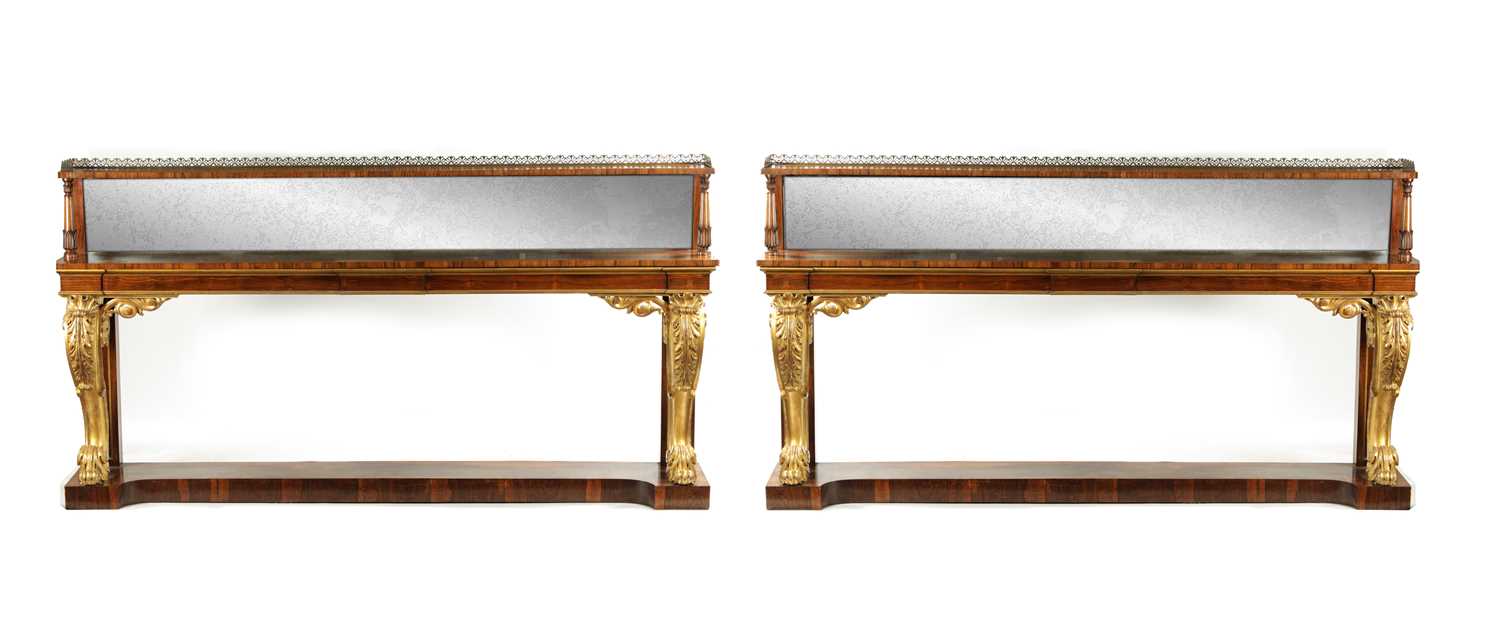 A MASSIVE PAIR OF REGENCY COUNTRY HOUSE FINE PAIR OF ROSEWOOD AND CARVED GILTWOOD CONSOLE TABLES IN