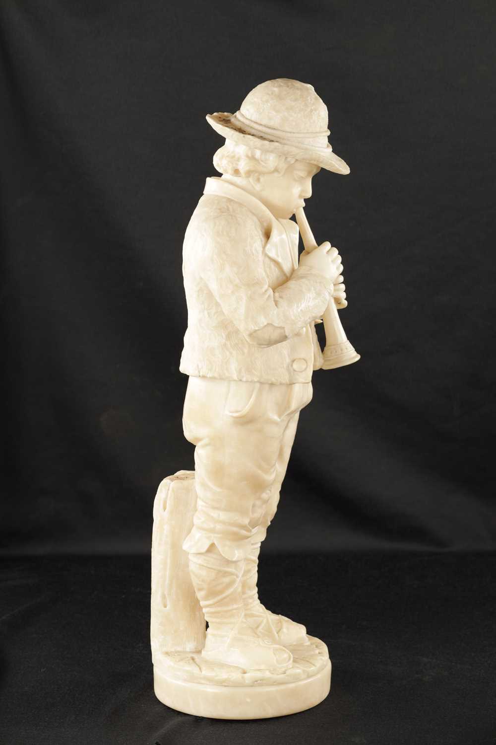 A 19TH CENTURY CARVED ALABASTER FIGURE OF A BOY PLAYING AN INSTRUMENT - Image 8 of 9