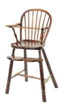 A 19TH CENTURY FRUITWOOD CHILDREN’S SPINDLE BACK HIGH CHAIR