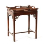 A REPRODUCTION CHIPPENDALE STYLE MAHOGANY TRAY ON STAND