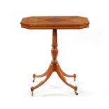 A REGENCY SATINWOOD AND AMBOYNA PANELLED OCCASIONAL TABLE